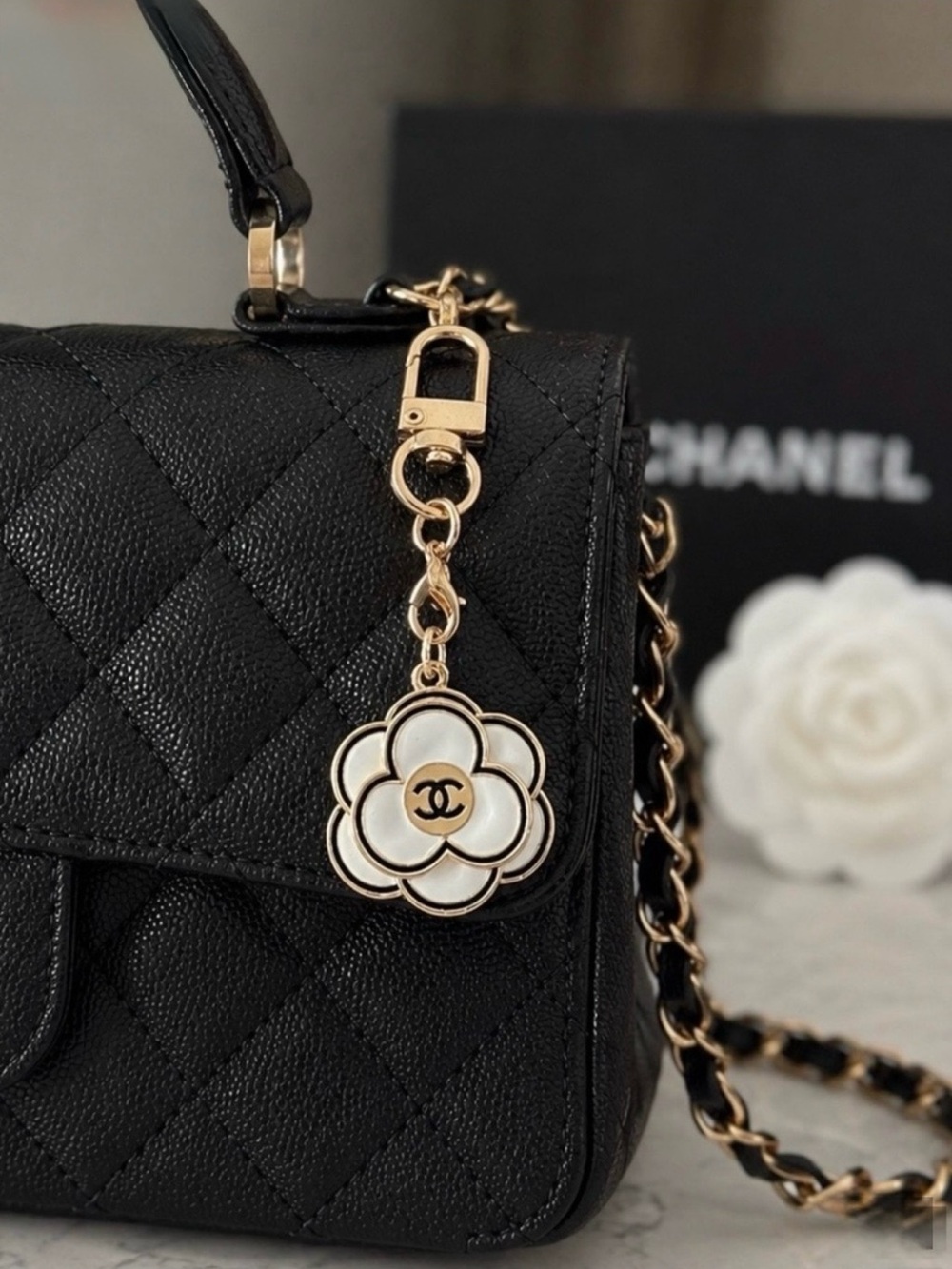 CHANEL GUC Camellia Bag
Charm/zip pull stamped.
3D Cream enamel charm (no bag)